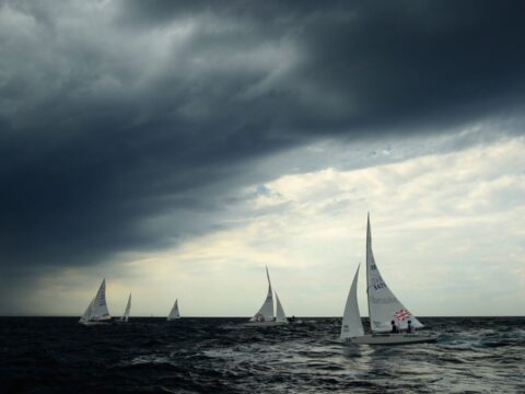 Race boats below stormy clouds (Credit: Mark Dadswell / Staff via Getty Images)